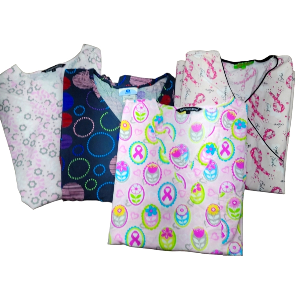 4 scrub tops mixed print. Size LARGE. lightly used smoke and animal free home.
